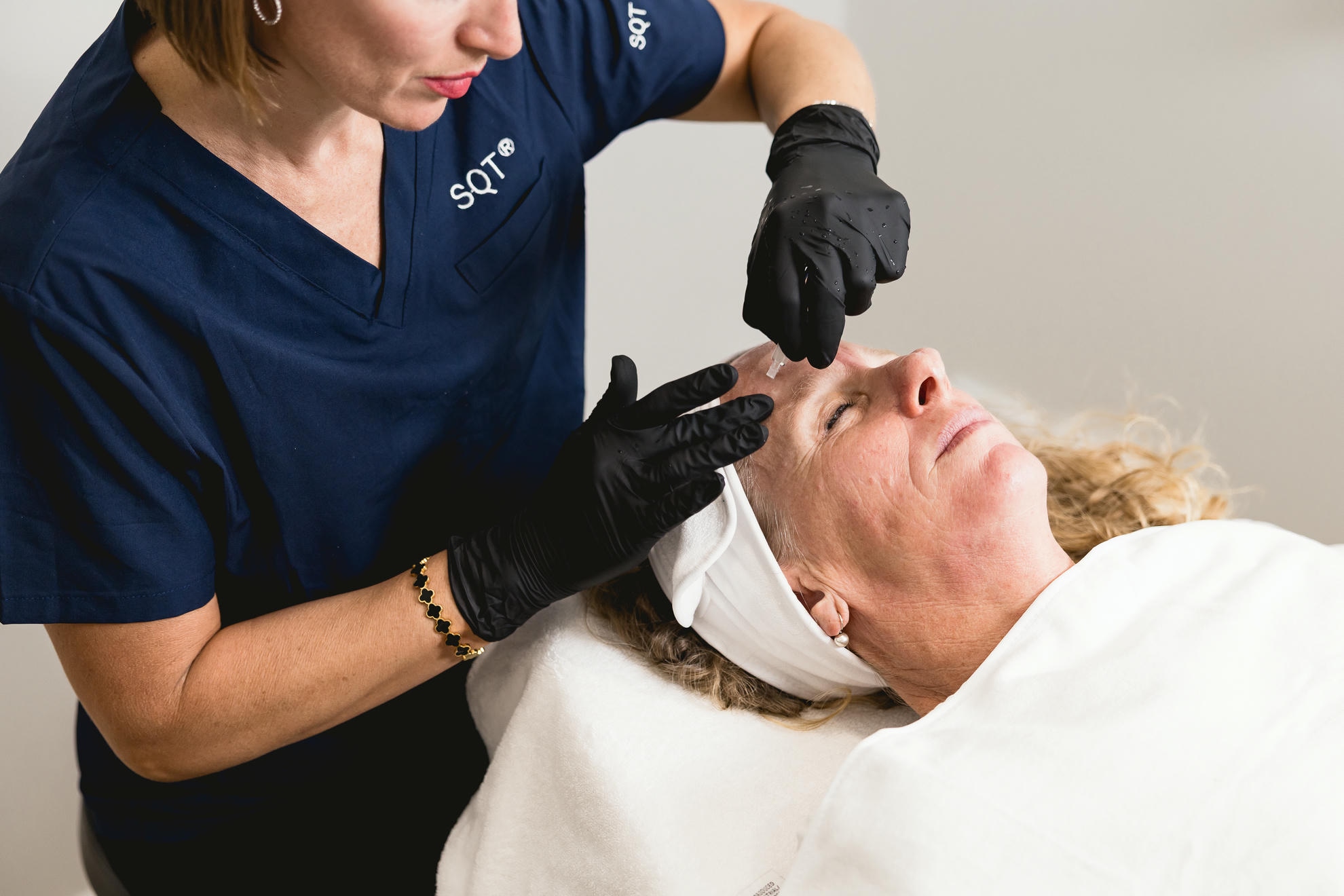 Clinician performing an advanced skin treatment at Avesa Health
